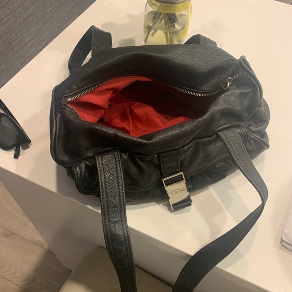 Black leather Kenneth Cole bag with red lining and silver hardware. - Picture 4 of 4